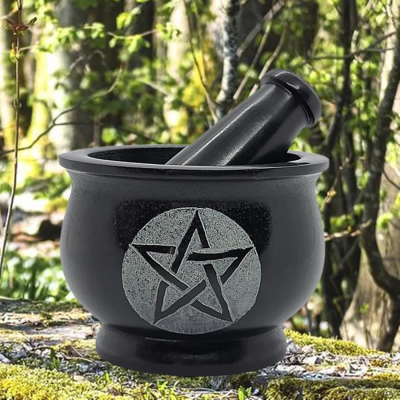 Natural stone mortar decorated with pentagrams. Practical and ideal for grinding plants or incense